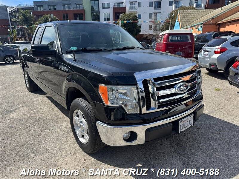 2011 Ford F-150 XL, V6 Flex Fuel, 40/20/40 split-bench seating Low