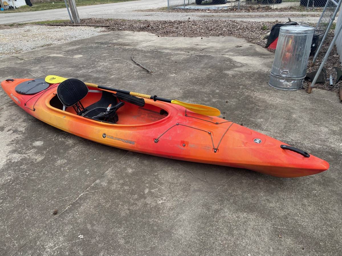 Wilderness Systems Pungo 125 kayak with paddle