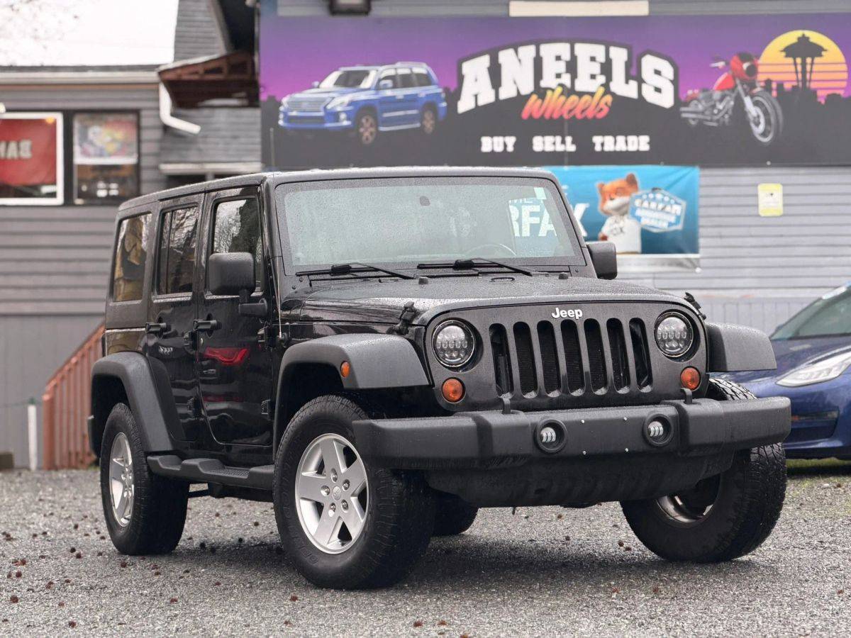 2012 Jeep Wrangler Unlimited 4 door 5 speed Manual transmission